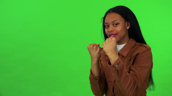 A Young Black Woman Does Box - Green Screen