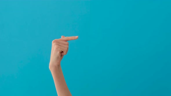 Closeup of a Woman's Hand Pointing to the Right Side