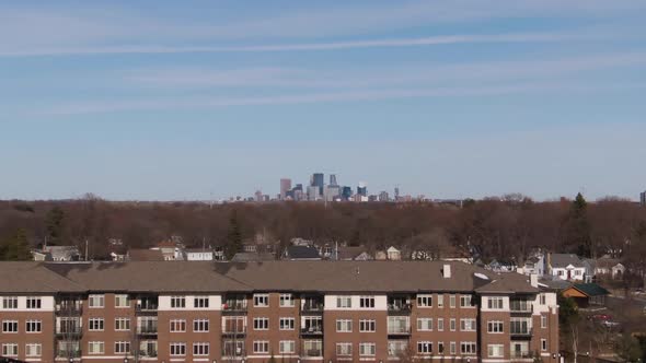 Minneapolis in the distance, parallax 4k drone clip