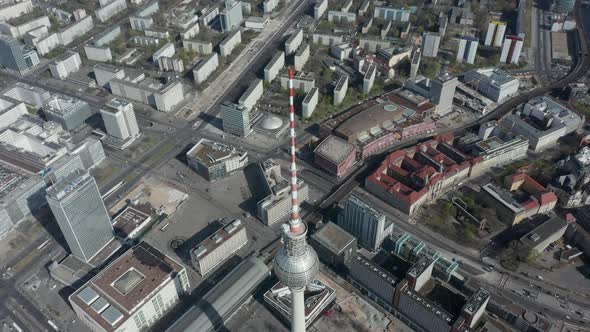 AERIAL: Wide View Above Alexanderplatz TV Tower in Empty Berlin on Sunny Day
