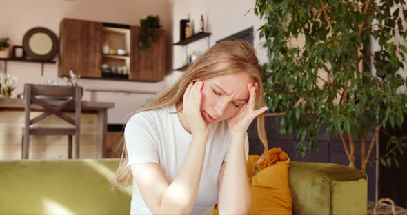 Young worried woman having psychological problem, feeling depression symptoms. Mental health.