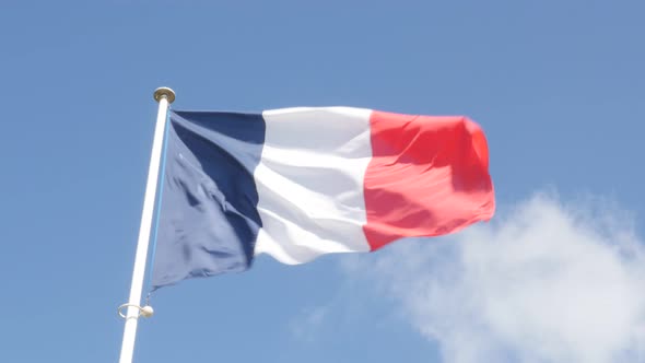 French flag  on the wind waving 4K 3840X2160 UltraHD footage - Flag of France  flowing against blue 