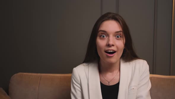 Closeup Portrait of Surprised Smiling Excited Young Woman Opening Her Mouth in Amazement Shouting