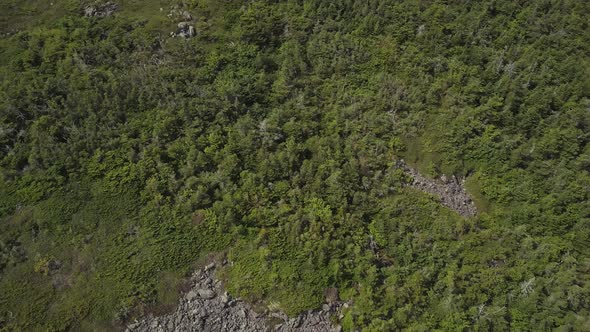 Aerial footage of White Cap Mountain situated within the watershed of the Pleasant River located in