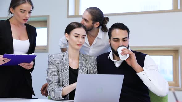 Business Meeting. People Working On Computer In Modern Office