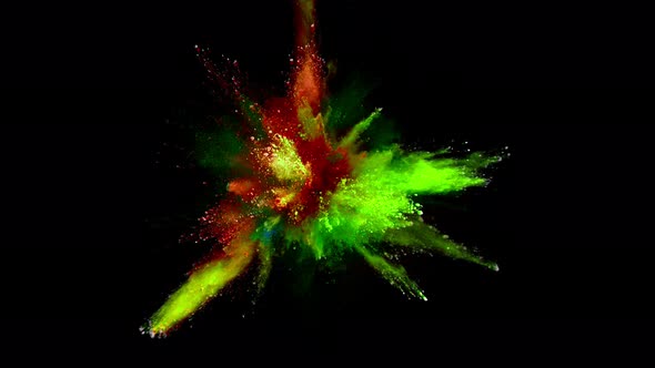 Super Slowmotion Shot of Color Powder Explosions Isolated on Black Background