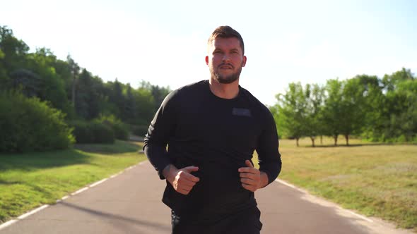 Fit Man Jogging at Park Street