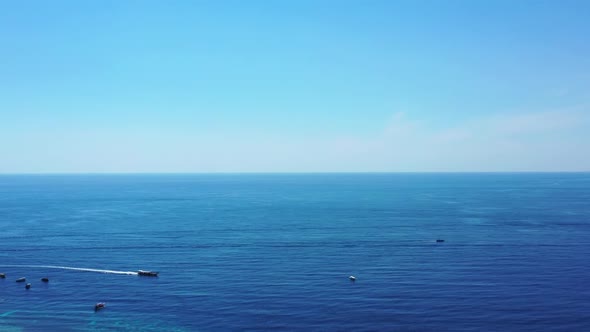 Aerial seascape of beautiful sea view beach wildlife by blue ocean and white sandy background of a d