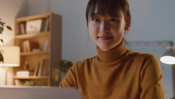 Portrait of Young Asian Businesswoman in Office