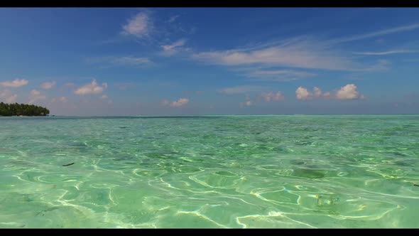 Aerial top view panorama of idyllic island beach vacation by blue lagoon with white sand background 