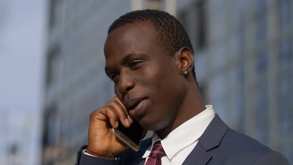  african American Young Business Man Talking by Phone- Close up Portrait