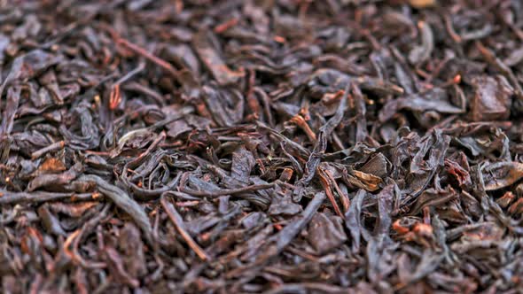 Looped Spinning Dry Black Tea Full Frame Closeup Background