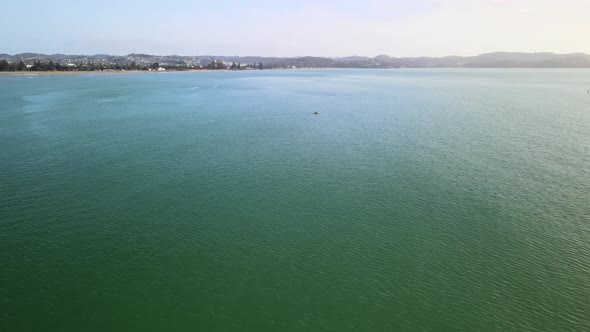 Ocean Kayaker paddling along the East coast of New Zealand