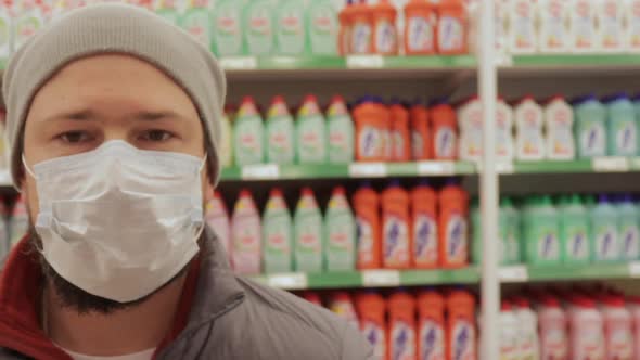 Man in Medical Mask at the Grocery Store.