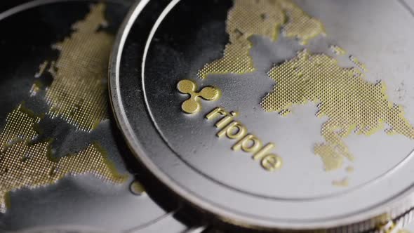 Rotating shot of Bitcoins (digital cryptocurrency) - BITCOIN RIPPLE