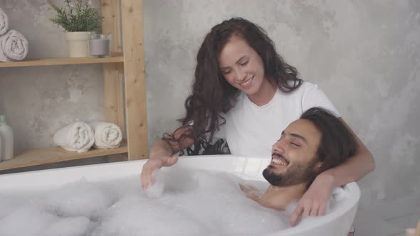 Romantic Couple Enjoying Bath Time Together