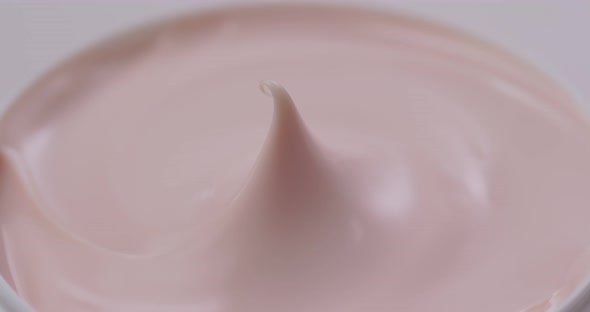 Cosmetic cream lotion in pink