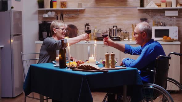 Couple Toasting Wineglasses