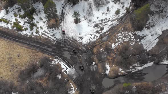 Flying Over People Riding ATVs Horizon Aerial View Of Young People Top View Of The Off-Road.Four