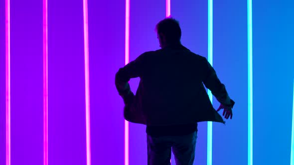 A Stylish Breakdancing Dance Show Performed By a Professional Dancer. Silhouette of a Man in Youth