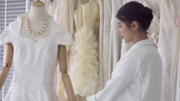 Future Bride Choosing Wedding Dress for Her Upcoming Wedding Ceremony