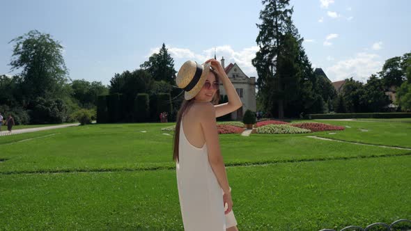 Brunette Woman in Park Area in Summer