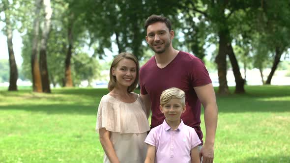 Smiling Family Showing Thumbs Up, Happy Secure Life, Togetherness and Relax