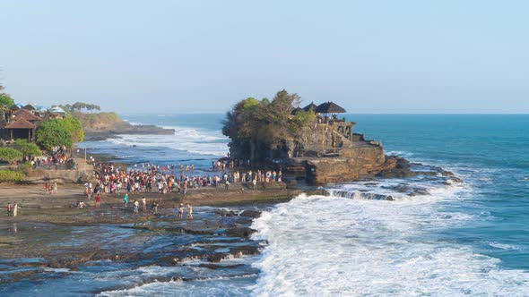 Time lapse of Pura Tanah Lot, the water temple at noon in Bali, Indonesia.