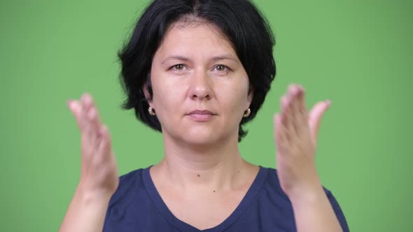 Beautiful Woman Covering Eyes As Three Wise Monkeys Concept