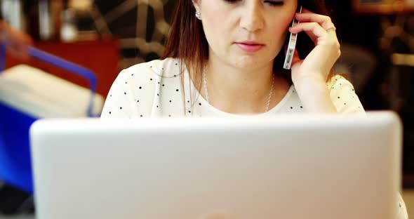 Businesswoman talking on mobile phone