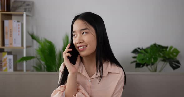 Woman talking mobile phone