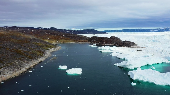 Environment. Antarctica. Giant floating Iceberg from melting glacier in Antarctica. Global Warming.