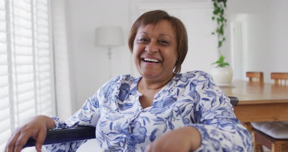 Portrait of happy african american senior woman smiling to camera