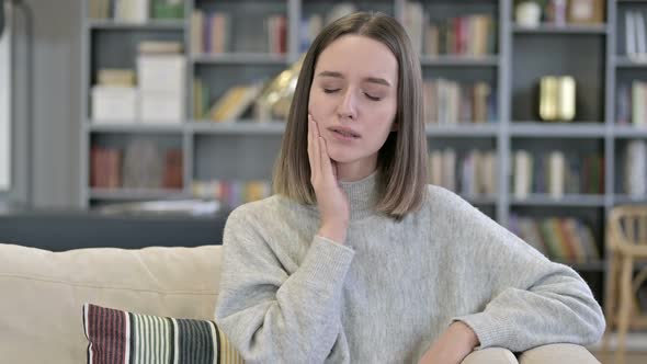 Portrait of Unhealthy Young Woman Having Toothache