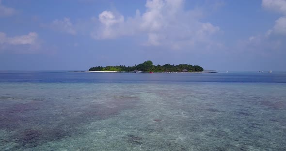 Luxury birds eye clean view of a white sand paradise beach and aqua turquoise water background in hi