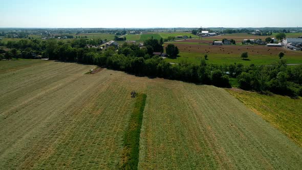 Amish Farmer Harvesting Crop