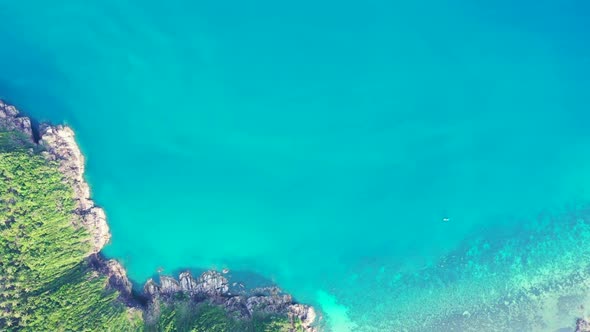 Aerial top down travel of exotic bay beach trip by turquoise water with white sand background of a d