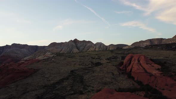 Drone shot flying over rocks and mountains in Snow Canyon state park, Utah