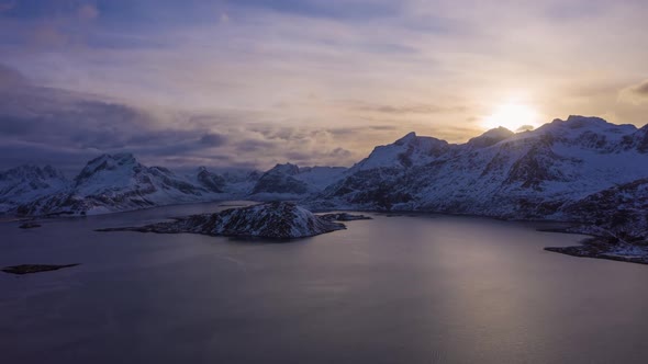 Fjord and Mountains at Sunset in Winter. Lofoten Islands, Norway. Aerial View