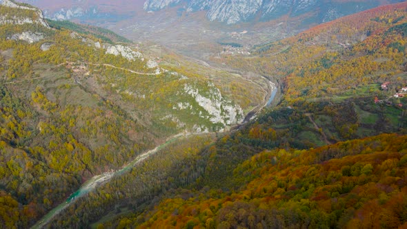 steep green mountains, deep forest and mountain road, beautiful valley and river