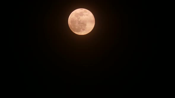 Full Moon at Night on Black Sky. Timelapse