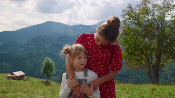 Woman Daughter Standing Mountain Meadow Close Up