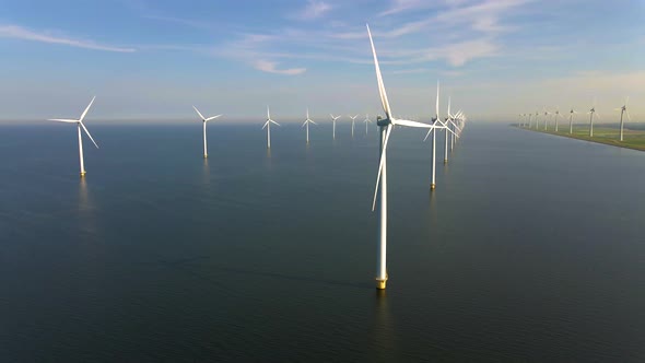 Wind Turbines in the Early Morning Wind Mill Park in the Netherlands