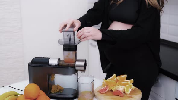 Pregnant Woman Wants Fresh Citrus Juice for Breakfast