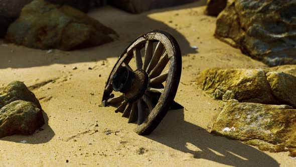 Old Wooden Cart Wheel at Sand Beach