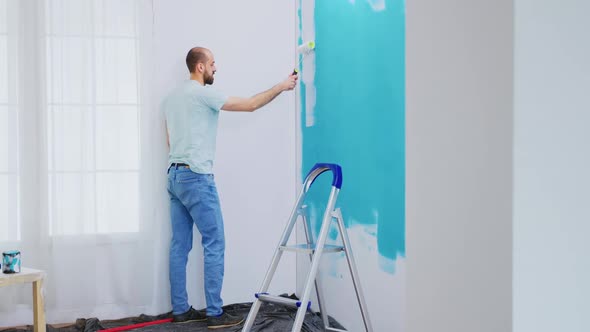 Painting Blue Wall