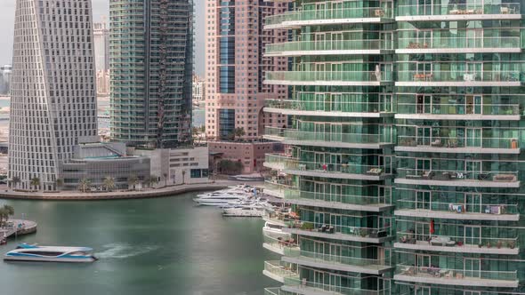 Aerial View of Dubai Marina Residential and Office Skyscrapers with Waterfront Timelapse