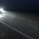 Car Drives Along Country Night Wet Road with Headlights Turned On, Seamless Loop - VideoHive Item for Sale