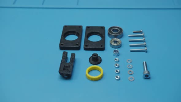 Pan Right Small Parts Prepared For Assembly Blue Background