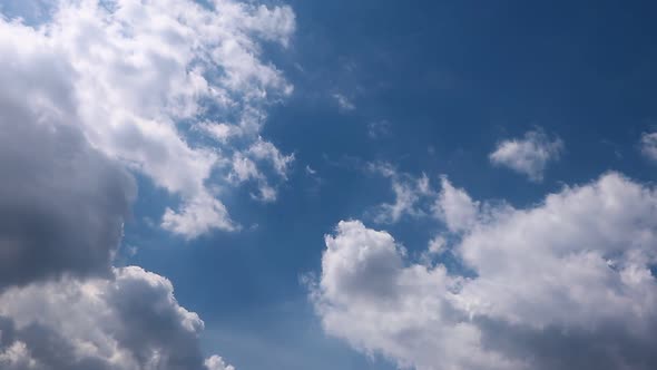 Timelapse summer clouds on blue sky